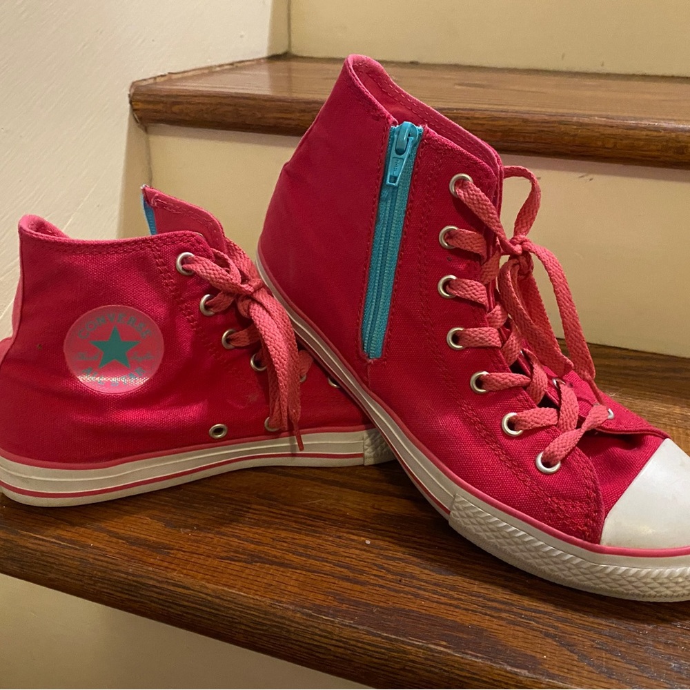 Pink w/side zip Hightop Converse. Barely worn, great condition!